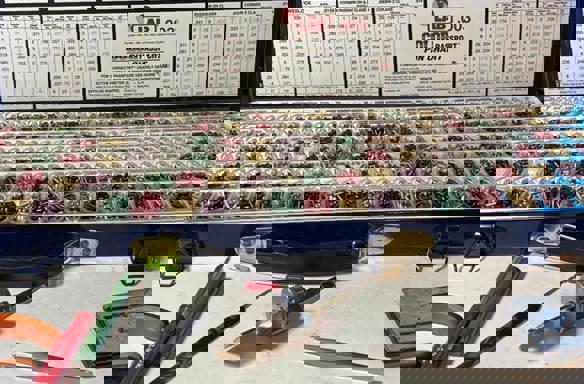 Lock rekeying kit with assorted pins, locksmith tools, and cylinder for professional keying.